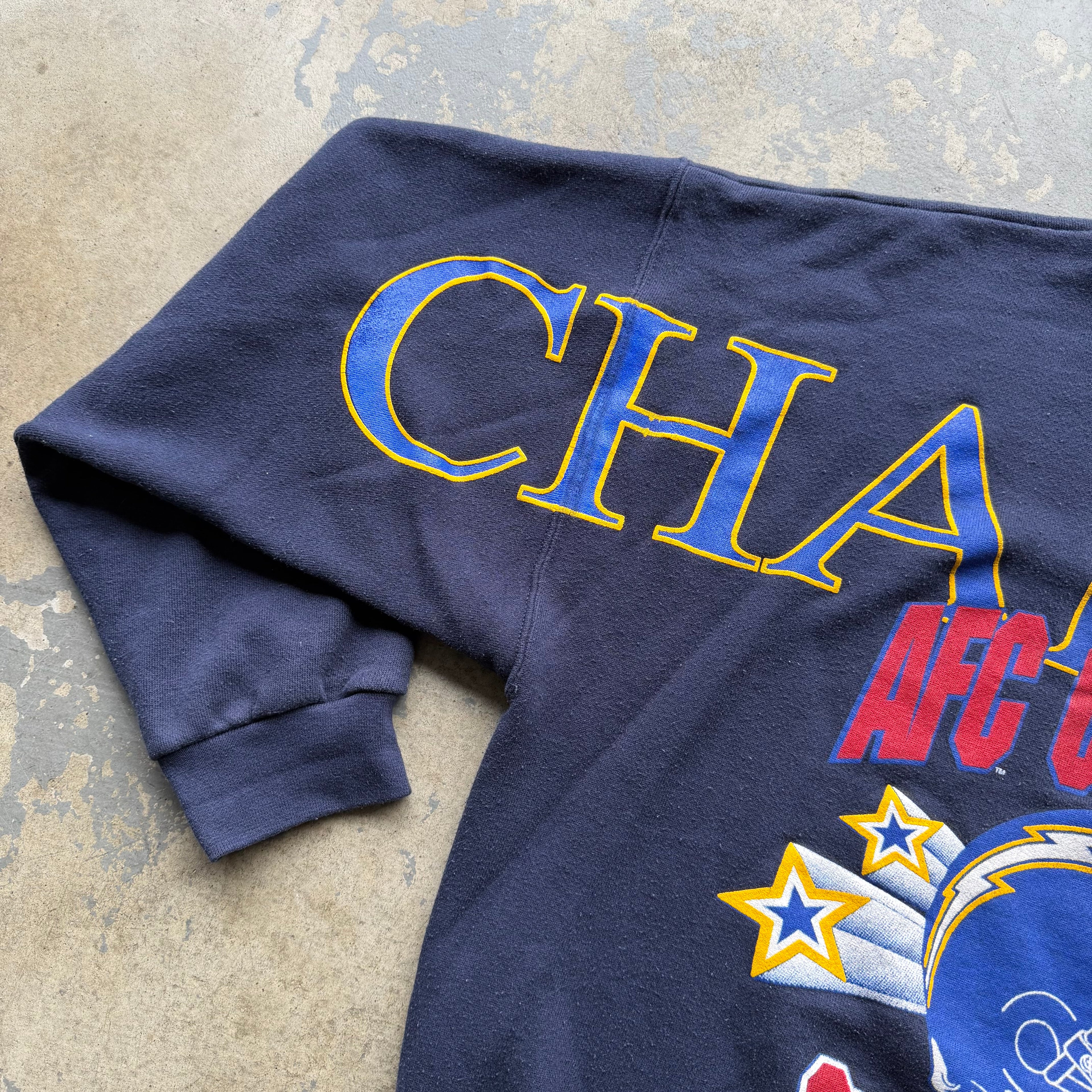 1995 CHARGERS AFC CHAMPIONS NAVY BLUE SPELLOUT CREWNECK (XL)