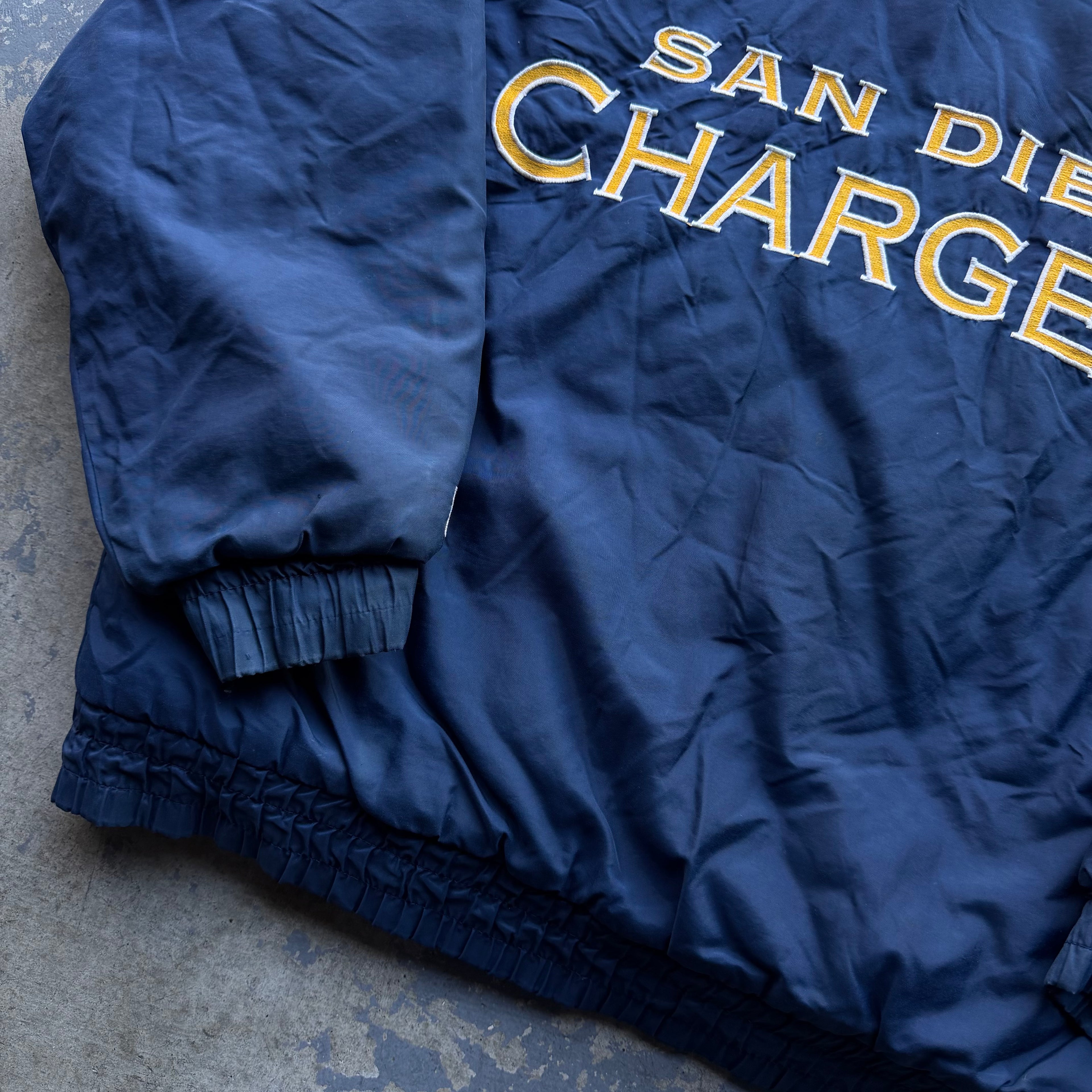90’S GAMEDAY LOGO 7 CHARGERS SPELLOUT PUFFER JACKET (XL)